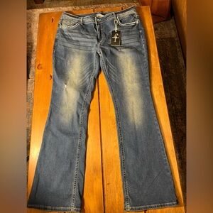 Women's Flare Jeans in Medium Blue with Faded Detail